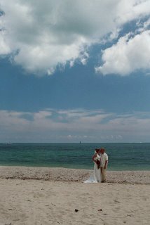 Chris & Chris Powell on the beach