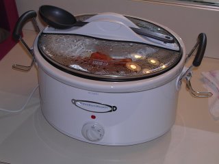 My new crockpot with the lock-down lid, usable carrying handles and it's own spoon
