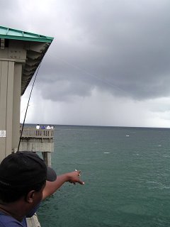 Begining of a funnel cloud and waterspout