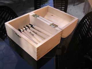 12 pack of wood carving tools in a wooden chest