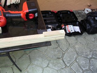 Stacked wood ready for drilling.